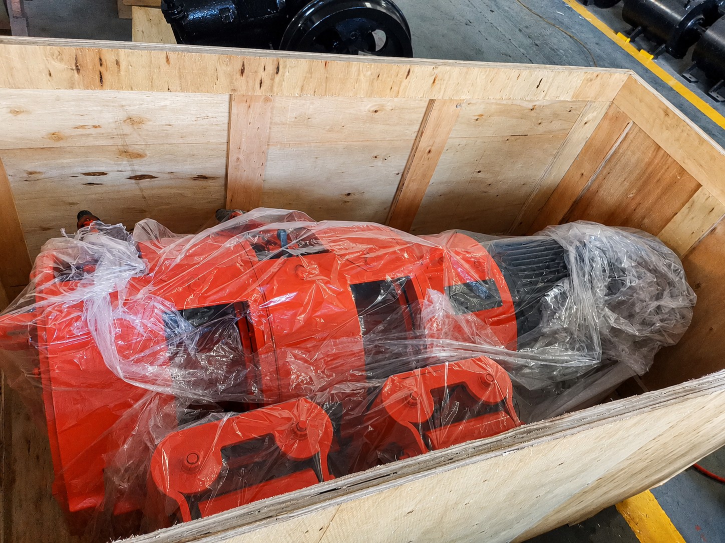The mining rake winch wrapped for protection inside an open wooden case.jpg The mining rake winch wrapped for protection inside an open wooden case.jpg