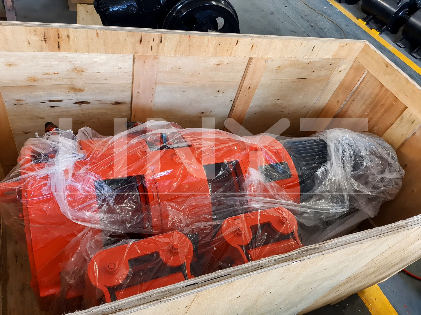 The mining rake winch wrapped for protection inside an open wooden case.jpg The mining rake winch wrapped for protection inside an open wooden case.jpg